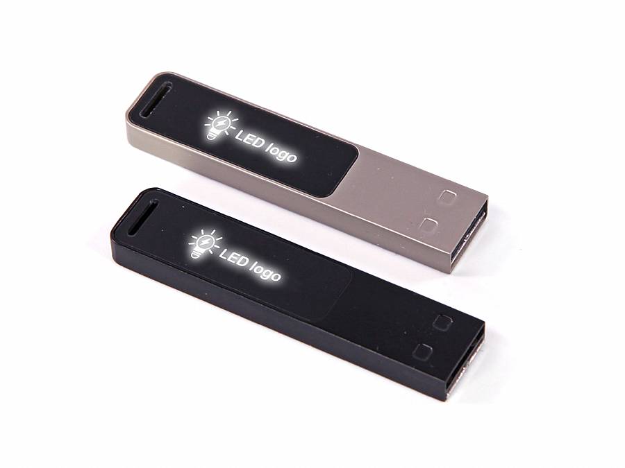 USB-Stick im schlanken Metalldesign in Schwarz und Silber mit LED-Beleuchtung und Platz für ein individuell gestaltbares Logo.