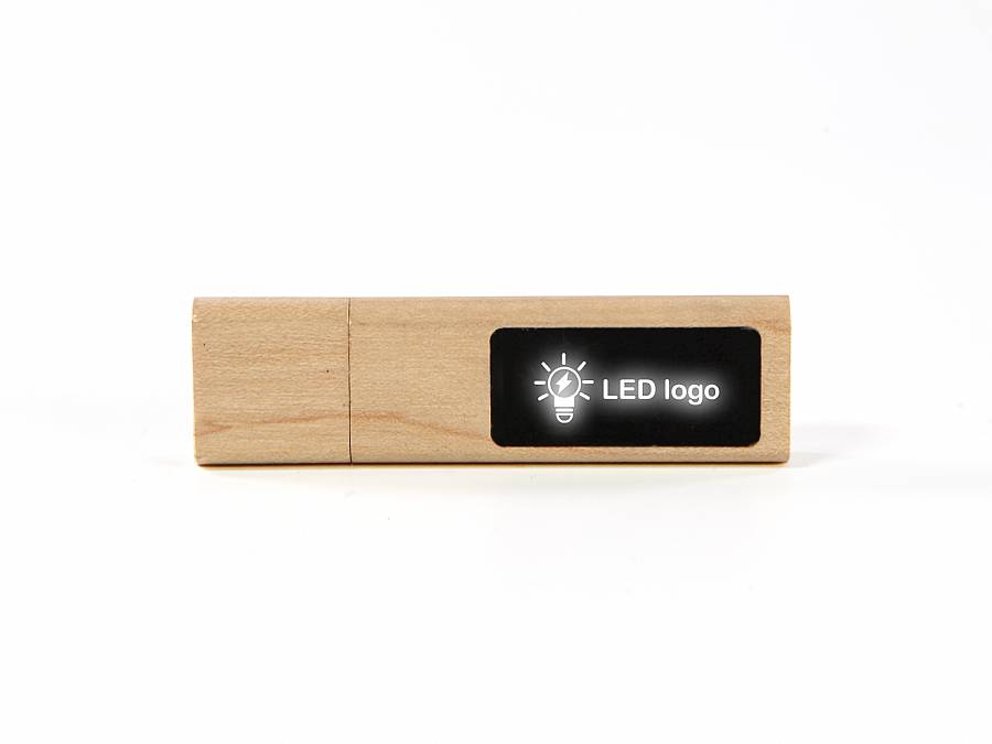 USB-Stick aus Holz mit individueller Fläche für ein beleuchtbares Logo. Praktisch für Werbezwecke und stilvoll im Design.
