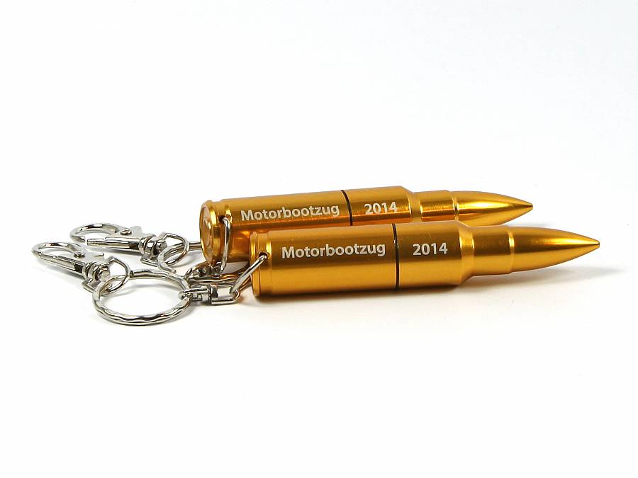 USB-Stick in Form von Patronen mit goldenem Gehäuse und Platz für individuelle Gravuren oder Logos. Ideal als Werbeartikel.