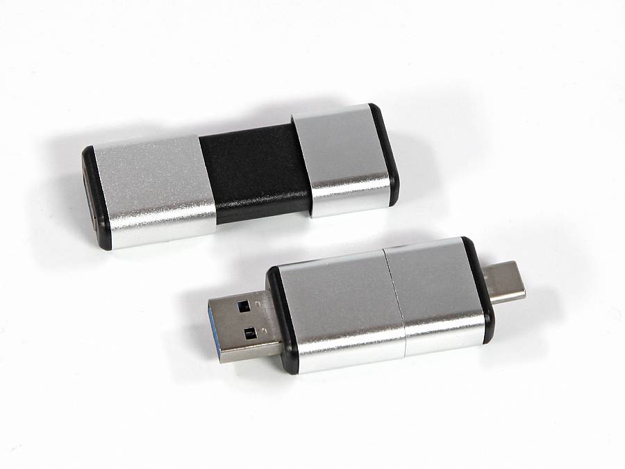 USB-Stick mit schiebbarer Technik in silbernem und schwarzem Design, ideal für individuelle Logo-Drucke.