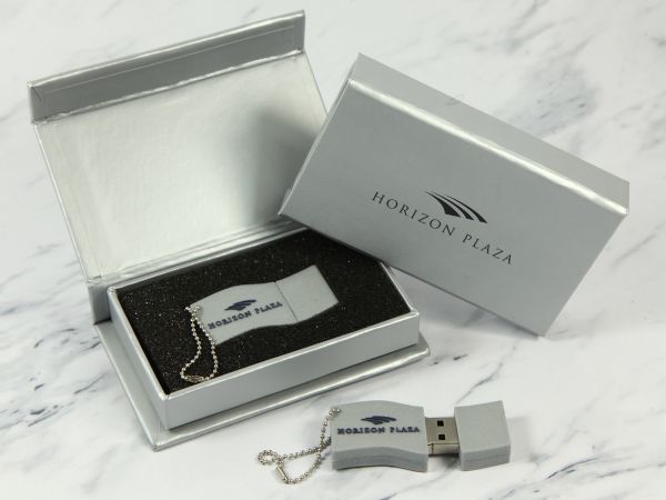 USB-Stick Logo wellig Kundenreferenz