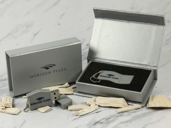 USB-Stick Logo wellig Kundenreferenz